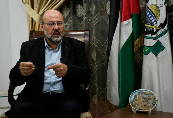 Ali Barakeh, a member of Hamas’s exiled leadership, speaks in an interview with The Associated Press in Beirut, Lebanon, on Oct. 9, 2023. (AP Photo/Hussein Malla)