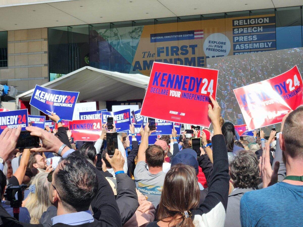 Supporters of Robert F. Kennedy Jr. listen to the announcement that he will run as an independent for president, in Philadelphia on Oct. 9, 2023. (Jeff Louderback/The Epoch Times)