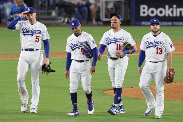 Freddie Freeman (5), Mookie Betts (50), Miguel Rojas (11), and Max Muncy (13) of the Los Angeles Dodgers are seen during the fourth inning against the Arizona Diamondbacks in Game Two of the Division Series at Dodger Stadium in Los Angeles on Oct. 9, 2023. (Kevork Djansezian/Getty Images)