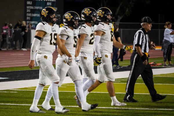 Members of Capistrano Valley High School's football team walk onto the field in Aliso Viejo, Calif., on Oct. 6, 2023. (Courtesy of Monica Acosta)