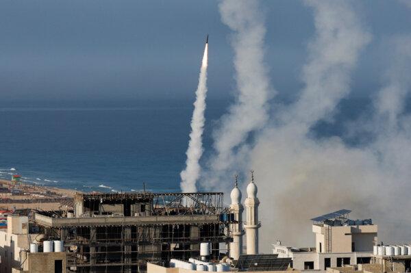 Rockets are fired by Palestinian militants into Israel in Gaza City on Oct. 7, 2023. (Mohammed Salem/Reuters_