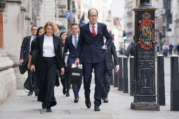Chair of the Afghanistan Inquiry, Sir Charles Haddon-Cave, arrives at the Royal Courts of Justice in London on Oct. 9, 2023. (PA)