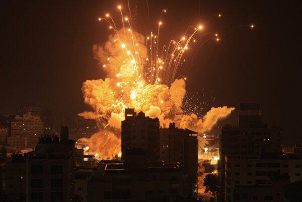 A missile explodes in Gaza City during an Israeli air strike on Oct. 8, 2023. (Mahmud Hams/AFP via Getty Images)