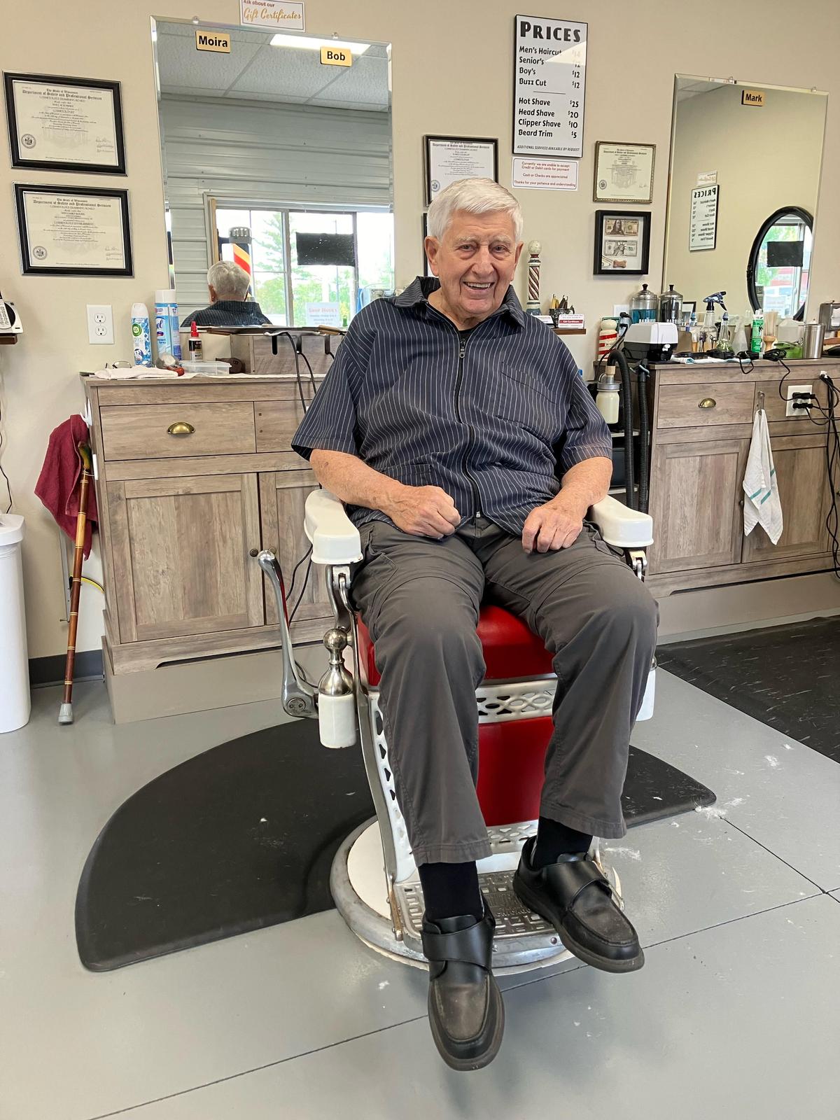 Robert Rohloff, 91, runs Bob’s Old Fashioned Barbershop in Hortonville. The shop houses old-fashioned equipment to emulate his father's shop, including a 100-year-old customer chair. (Courtesy of Mark Karweick)