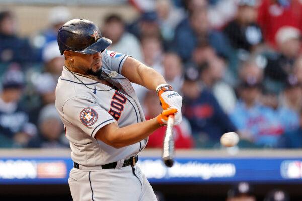 José Abreu (79) of the Houston Astros hits a home run in the ninth inning against the Minnesota Twins during Game Three of the Division Series at Target Field in Minneapolis on Oct. 10, 2023. (David Berding/Getty Images)