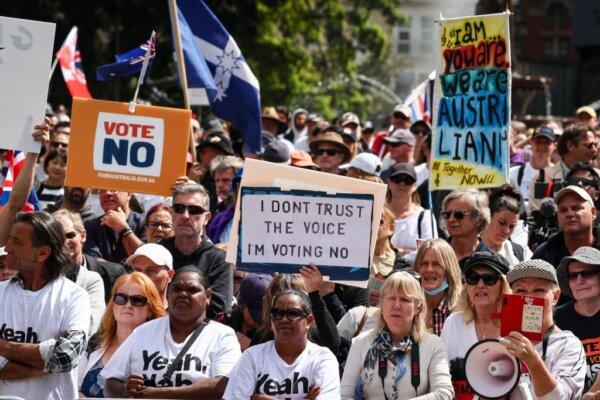 Demonstrators hold signs and placards as they attend a rally in Sydney on Sept. 23, 2023, to show their opposition to landmark Indigenous reform ahead of an Oct. 14 referendum. (David Gray/AFP via Getty Images)