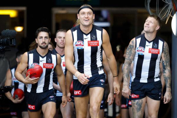 Darcy Moore of the Magpies leads his side up the race during the 2023 AFL Grand Final match at the Melbourne Cricket Ground on Sept. 30, 2023. (Dylan Burns/AFL Photos via Getty Images)
