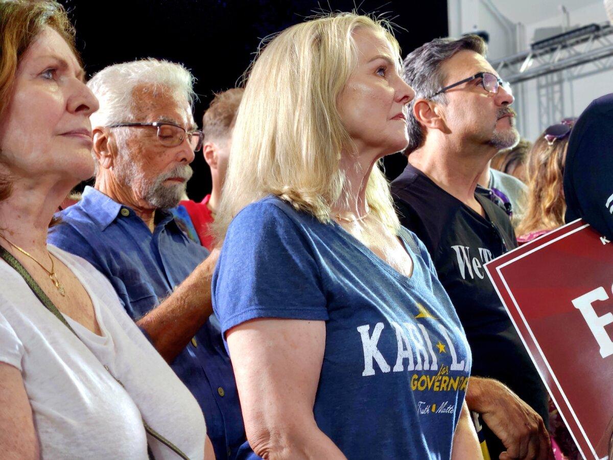 Supporters of Kari Lake for U.S. Senate listen as the Republican candidate addresses a large crowd in Scottsdale, Ariz., on Oct. 10, 2023. (Allan Stein/The Epoch Times)