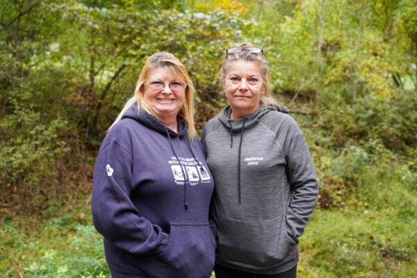 Ronnett Whitlock (L) and Heather Staeker during a guided walk along the dried-up Delaware and Hudson Canal in Cuddebackville, N.Y., on Oct. 8, 2023. (Cara Ding/The Epoch Times)
