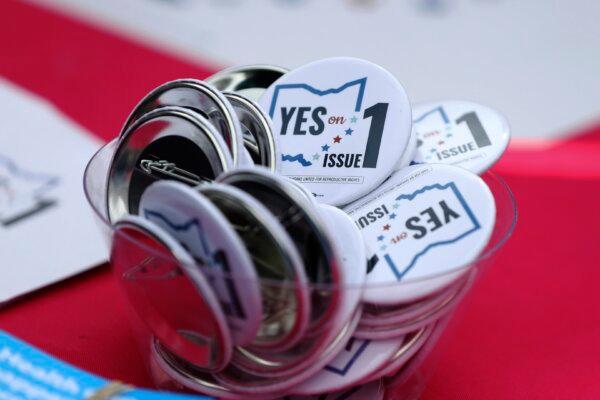 Buttons supporting Issue 1, the Right to Reproductive Freedom amendment, sit on display at a rally held by Ohioans United for Reproductive Rights at the Ohio Statehouse in Columbus on Oct. 8, 2023. (Joe Maiorana/AP Photo)