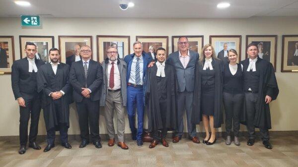 Challengers to the travel vaccine mandate and their lawyers in Ottawa on Oct. 11, 2023. PPC Leader Maxime Bernier is in the centre. To his right is Karl Harrison and to his left Nabil Ben Naoum and Shaun Rickard. (Tamar Harrison)
