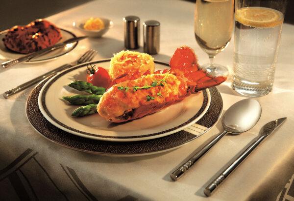 Long-haul and ultra-long-haul airlines such as Qantas and Singapore Airlines hire world-class chefs to oversee their culinary traditions. On Singapore Airlines, lobster thermidor is available for passengers in suites and first class. (Singapore Airlines/TNS)