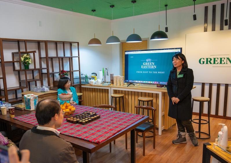 Winnie Tse, the Deputy General Manager of “Green Eastern” in the United States, shares her views at the opening ceremony. (Shao Lin/The Epoch Times)