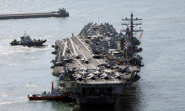 US Aircraft Carrier Arrives in South Korea as North’s Leader Kim Exchanges Messages With Putin