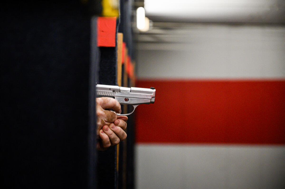 A person practices with a pistol at a shooting range in New York on June 23, 2022. (Ed Jones/AFP via Getty Images)