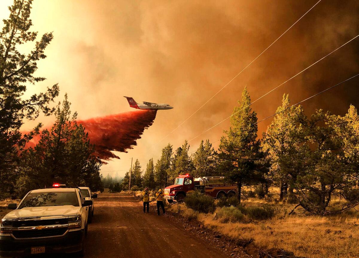 A firefighting airtanker drops retardant over the Grandview Fire on July 11, 2021 northeast of Sisters, Ore., on July 11, 2021. (Oregon Department of Forestry via Getty Images)