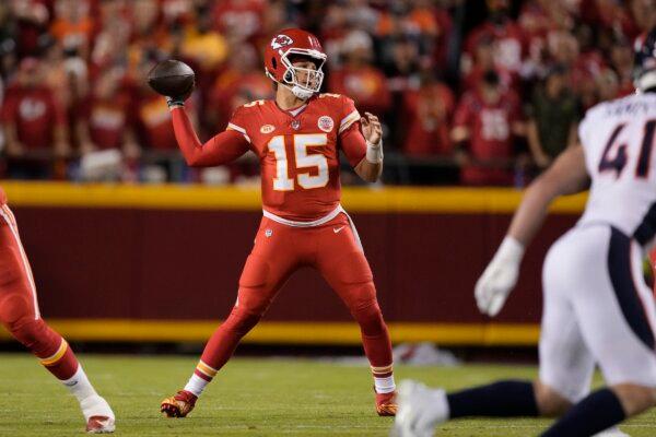 Kansas City Chiefs quarterback Patrick Mahomes (15) throws during the first half of an NFL football game against the Denver Broncos in Kansas City on Oct. 12, 2023. (Charlie Riedel/AP Photo)