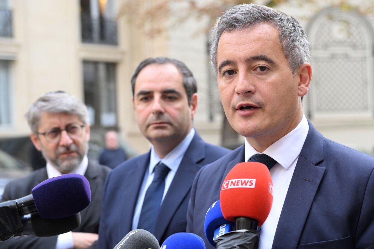 French Interior Minister Gerald Darmanin (right) speaks to the press after a meeting on strengthening security at Jewish community sites in Paris on Oct. 9, 2023. (Bertrand Guay/POOL/AFP via Getty Images)