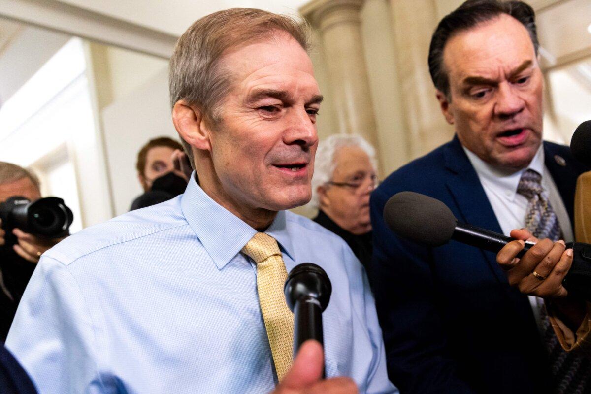 Representative Jim Jordan, Republican of Ohio, speaks to reporters as he arrives for a Republicans caucus meeting at the Longworth House Office Building on Capitol Hill in Washington on Oct. 13, 2023. (Julia Nikhinson/AFP via Getty Images)
