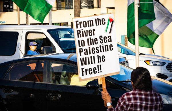 Protesters wave Palestinian and Latin American flags in support of Palestinians and Hamas in Los Angeles, Calif., on Oct. 12, 2023. (John Fredricks/The Epoch Times)