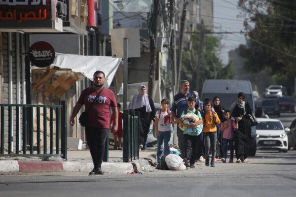 Palestinians displaced from their homes as a result of Israeli raids on Hamas targets in Gaza City, Gaza, on Oct. 13, 2023. (Ahmad Hasaballah/Getty Images)