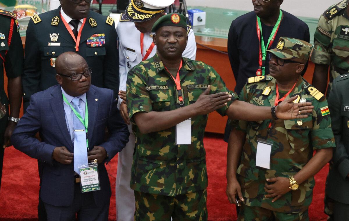 Commissioner for Political Affairs, Peace and Security of Economic Community of West African States, Ambassador Abdel-Fatau Musah (L); Nigeria's Chief of Defense Staff, Gen. Christopher Musa (C); and Ghana's Chief of Defense Staff, Vice Adm. Seth Amoama (R), after a meeting in Abuja, Nigeria, on the political unrest in the Republic of Niger on Aug. 2, 2023. (Kola Sulaimon/AFP via Getty Images)