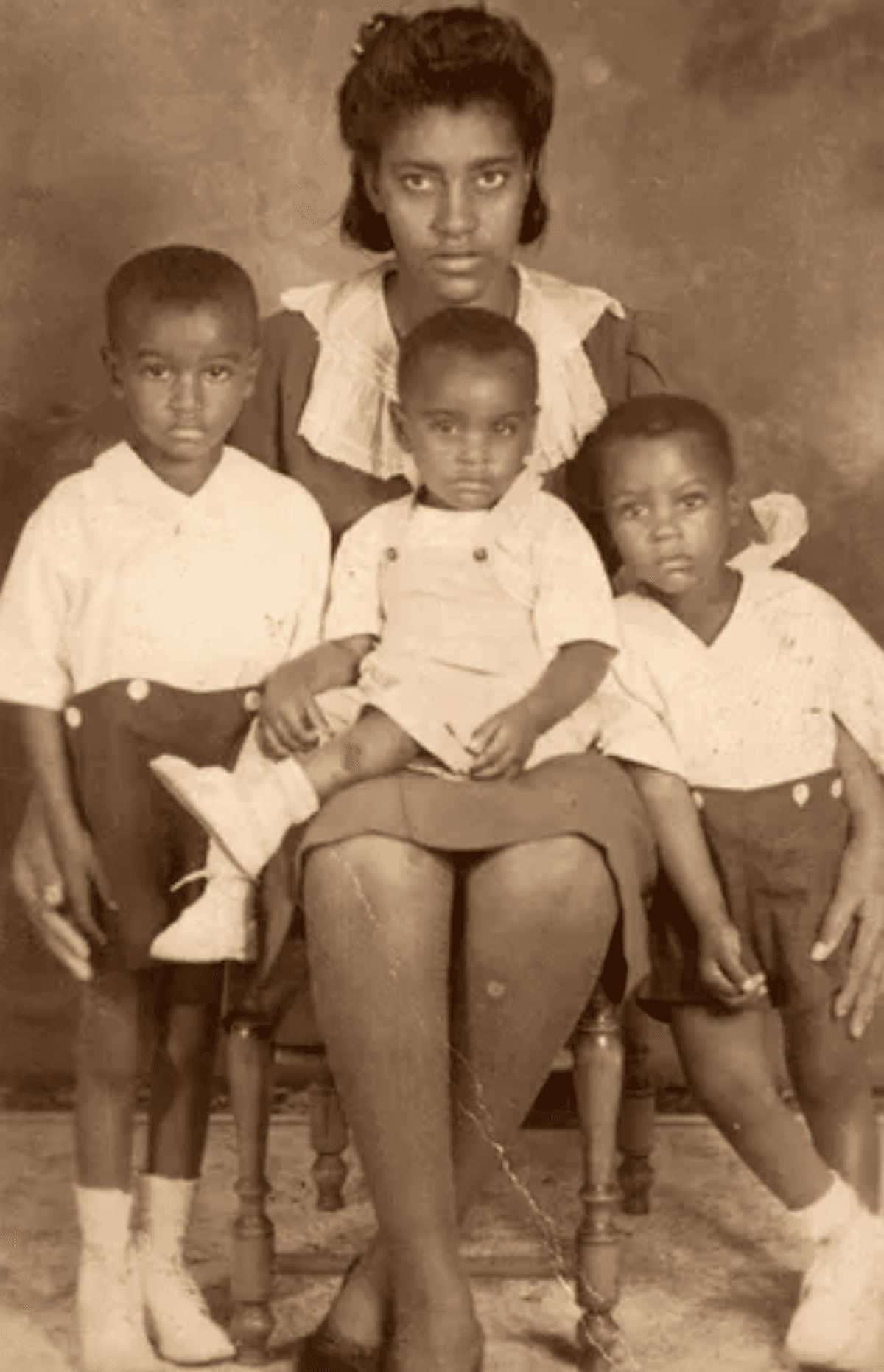 Ms. Whiteside at 19 with her sons Cleovis Jr., James, and Willie. (Courtesy of Kathy Whiteside-Sims)