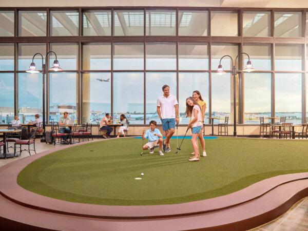 Golfers can practice their swing on a putting green at the Palm Beach International Airport. (Photo courtesy of the Palm Beach International Airport)