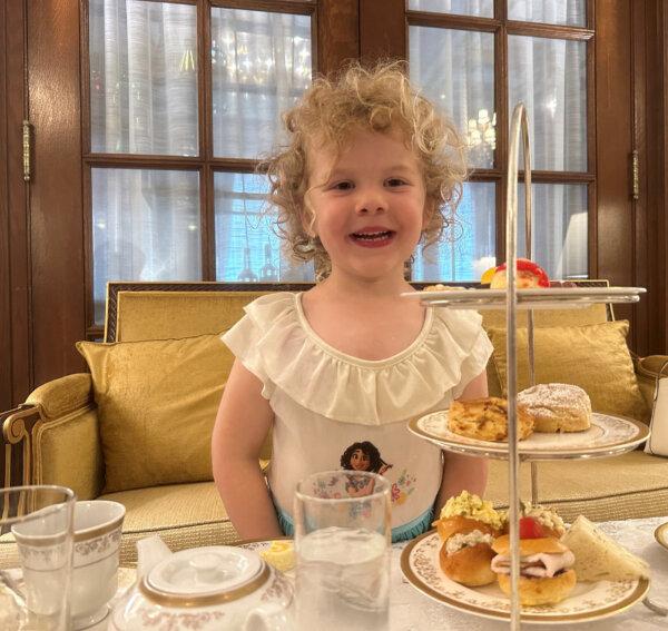 The author's granddaughter, Charlotte, enjoys a children's tea at the Willard InterContinental Hotel in Washington, D.C. (Candyce H. Stapen)