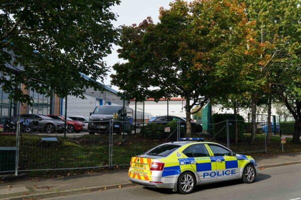 Police patrol outside the UAV Tactical Systems factory in Leicester, which has been the site of a number of protests by activist group Palestine Action, on Oct. 10, 2023. (Jacob King/PA)