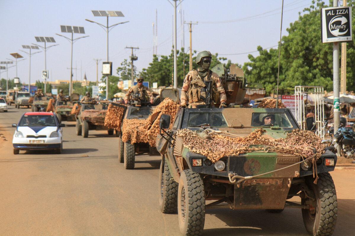 A convoy of French troops based in Niger drives in Niamey, on Oct. 10, 2023. (Mahamadou Hamidou/Reuters)