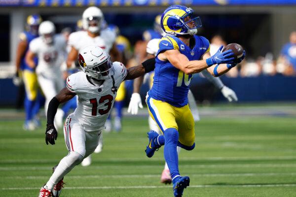 Cooper Kupp (10) of the Los Angeles Rams catches a pass against Kei’Trel Clark (13) of the Arizona Cardinals during the second quarter in Inglewood, Calif., on Oct. 15, 2023. (Ronald Martinez/Getty Images)