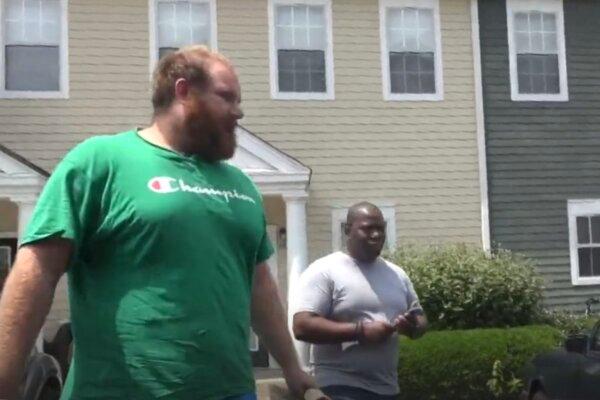 Alex Rosen (L), founder of Predator Poachers, confronts now-former Virginia firefighter Lt. Christopher Scott Jones for soliciting sex from a decoy posing as an 11-year-old girl in 2022, which resulted in a 33-year-prison sentence announced in October 2023. (Rumble/Screenshot via The Epoch Times)