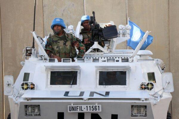Peacekeepers of the United Nations Interim Force in Lebanon (UNIFIL) man their armored vehicle in Lebanon's southern town of Naqoura near the border with Israel on Oct. 15, 2023. (AFP via Getty Images)