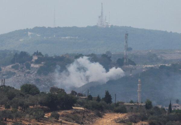 Smoke rises from Dhayra village after Israeli shelling as seen from the town of Marwahin in southern Lebanon, near the border with Israel, on Oct. 11, 2023. (Mohamed Azakir/Reuters)