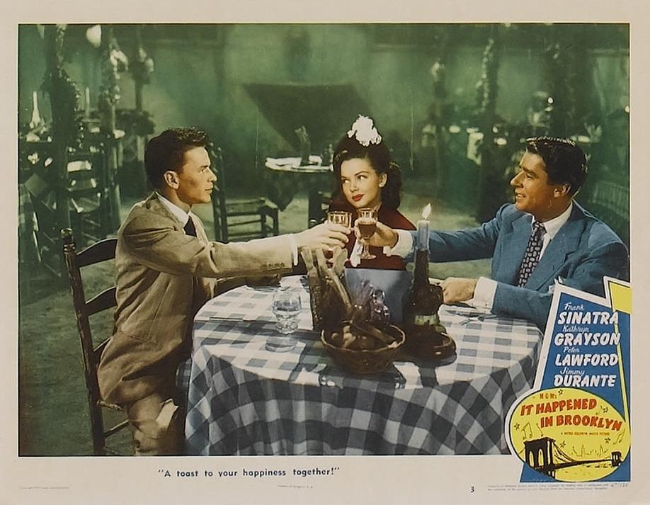 Lobby card from the 1947 film “It Happened in Brooklyn” starring (L-R) Frank Sinatra, Kathryn Grayson, and Peter Lawford. (MovieStillsDB)
