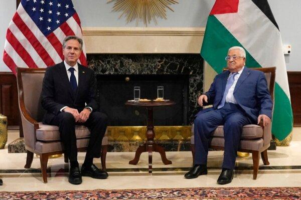 U.S. Secretary of State Antony Blinken (L) meets with Palestinian President Mahmoud Abbas in Amman, Jordan on Oct. 17, 2023. (Jacquelyn Marti/Pool/AFP via Getty Images)