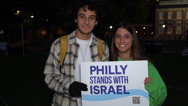 High school students Markus Kanter and Talia Hurtig (R), who just returned from Israel, attend the “Philly Stands with Israel” rally on Oct. 16, 2023. (William Huang/The Epoch Times)