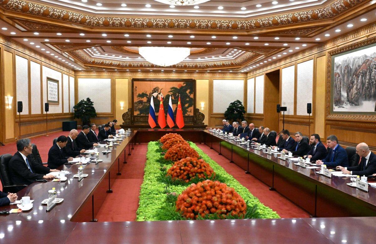 Russian President Vladimir Putin (6R), Chinese leader Xi Jinping (4L), and members of both nations' delegations are meeting in Beijing on Oct. 18, 2023. (Sergei Guneyev/Pool/AFP via Getty Images)