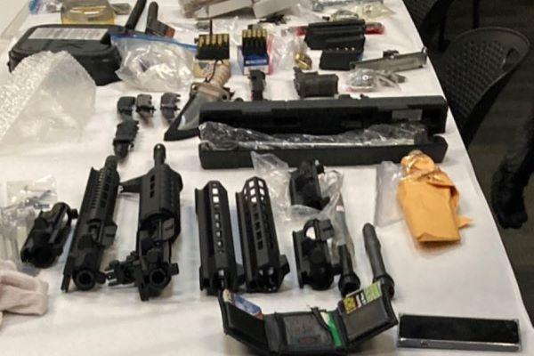 Firearms confiscated from a motel room after a five-hour standoff between a suspect and law enforcement officers in Spring Valley, Calif., on Oct. 16, 2023. (Courtesy of San Diego County Sheriff's Department)