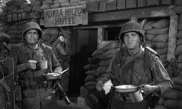 The soldiers of K Company have to endure communist propaganda being broadcast through loudspeakers, in “Pork Chop Hill.” (United Artists)