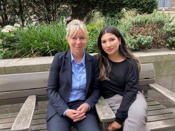 Iqra Subhani (R), the sister of murder victim Mohammed Shah Subhani, sits with Metropolitan Police Detective Chief Inspector Vicky Tunstall (L) outside the Old Bailey in central London on Oct. 5, 2023. (Emily Pennink/PA)