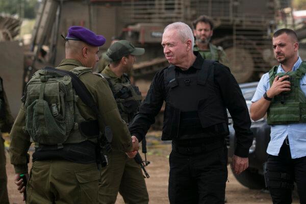 Israeli Minister of Defence Yoav Gallant meets soldiers on the Israeli border with the Gaza Strip in Sderot, Israel, on Oct. 19, 2023. (Amir Levy/Getty Images)