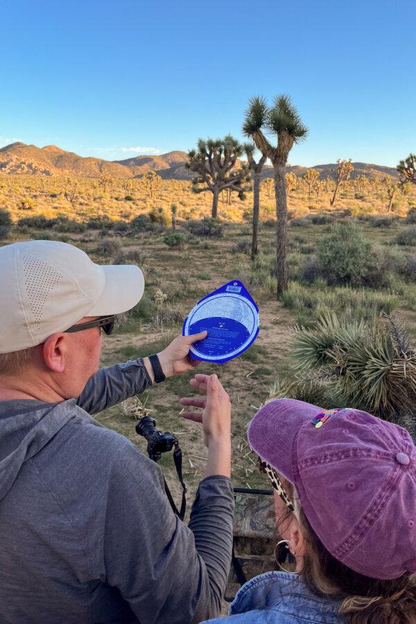 John Norris demonstrates how to use a rotating star finder to locate the Milky Way (though he prefers to use an app on his phone) during a dark sky photography workshop, led by Desert Institute on Sept. 16, 2023. (Julia Carmel/Los Angeles Times/TNS)