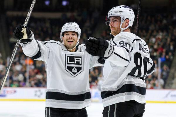Los Angeles Kings center Pierre-Luc Dubois (80) celebrates after his goal against the Minnesota Wild with teammate left wing Kevin Fiala (22) during the first period of an NHL hockey game in St. Paul, Minn., on Oct. 19, 2023. (Matt Krohn/AP Photo)