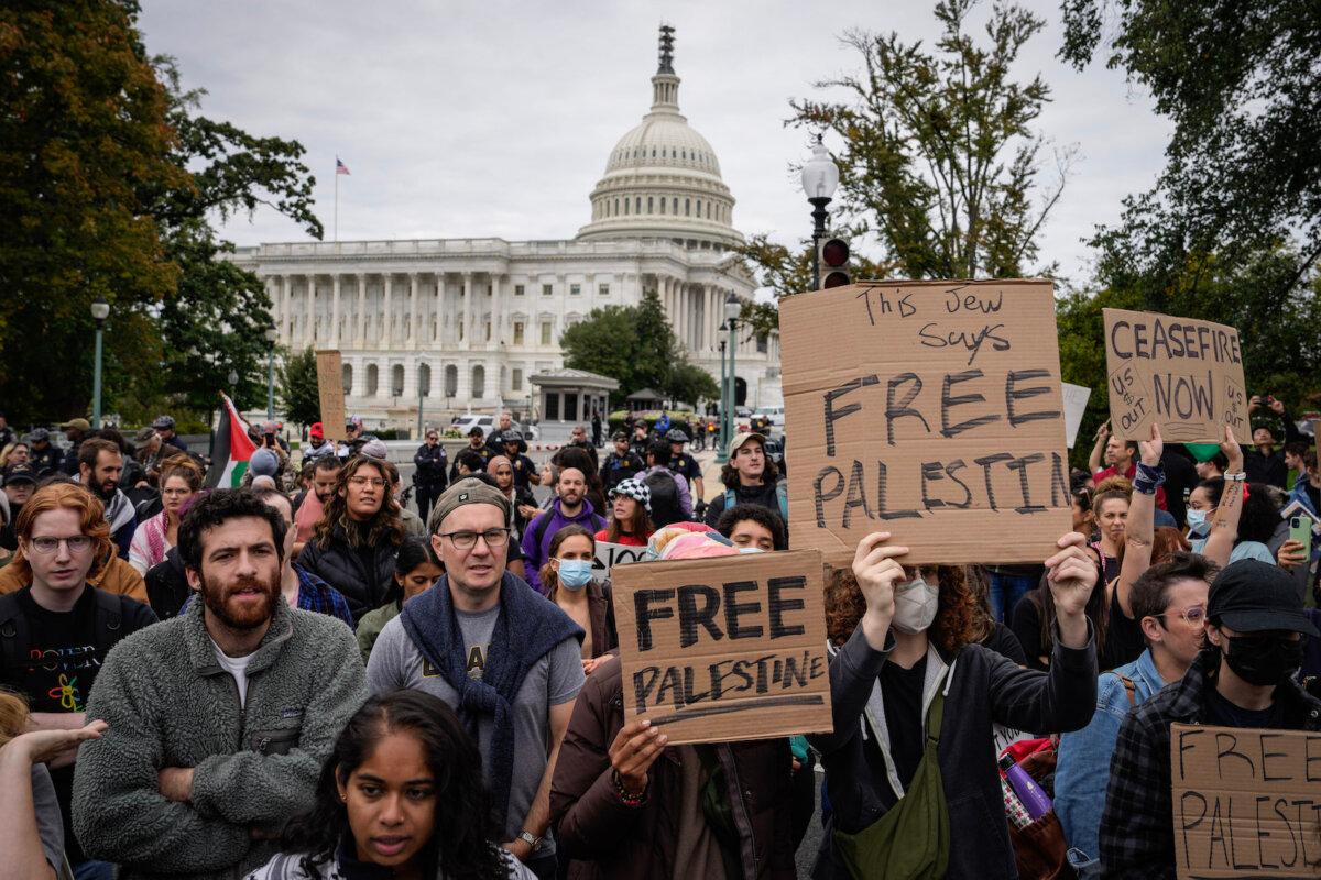 Demonstrators rally to demand a cease-fire against Palestinians in Gaza on Independence Avenue near the U.S. Capitol in Washington on Oct. 18, 2023. (Drew Angerer/Getty Images)