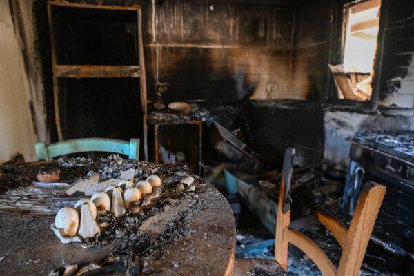 Charred eggs remain on a table in a burned house following an attack by Hamas terrorists days earlier on the kibbutz near the Gaza border in Nir Oz, Israel, on Oct. 19, 2023. (Alexi J. Rosenfeld/Getty Images)