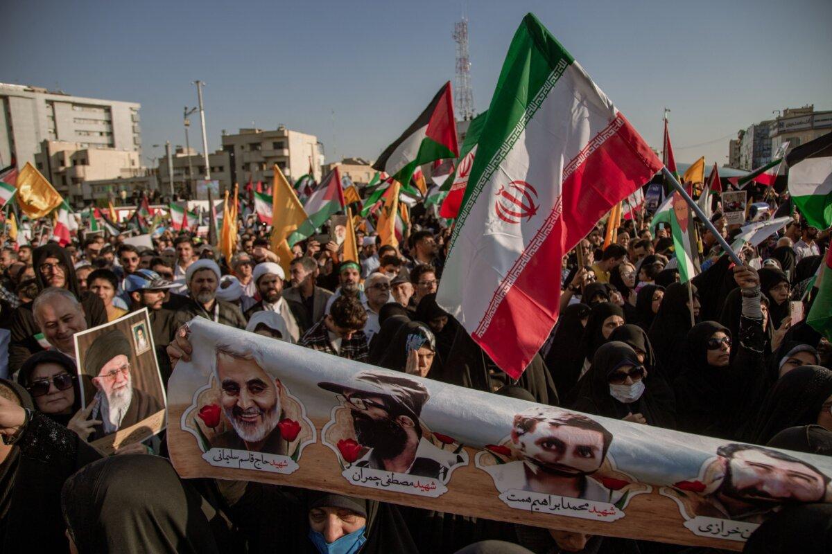 Iranian pro-government supporters participate in an anti-Israeli rally on Enghelab Street to express their support for Palestinians, in Iran, on Oct. 18, 2023. (Hossein Beris AFP via Getty Images)