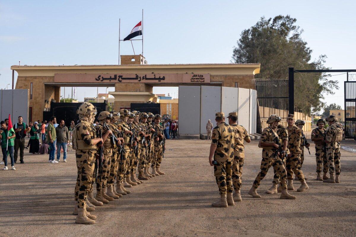 Egyptian army soldiers stand guard ahead of a press conference by the U.N. secretary-general on the Egyptian side of the Rafah crossing on the border with the Gaza Strip on Oct. 20, 2023. (Ali Moustafa/AFP via Getty Images)