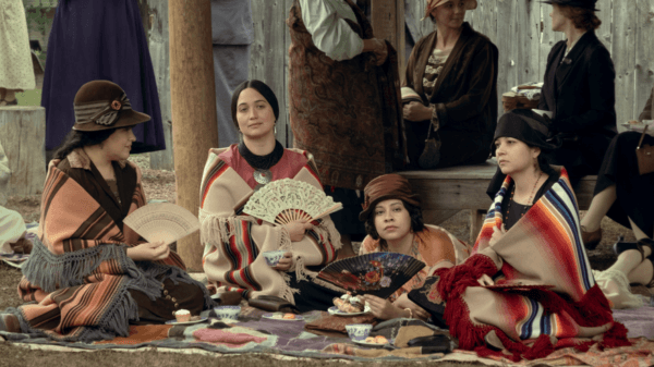 Mollie Kyle (Lily Gladstone, 2nd L) sits with her sisters, in "Killers of the Flower Moon." (Melinda Sue Gordon/Apple TV+)